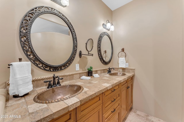 bathroom featuring vanity and tile patterned flooring