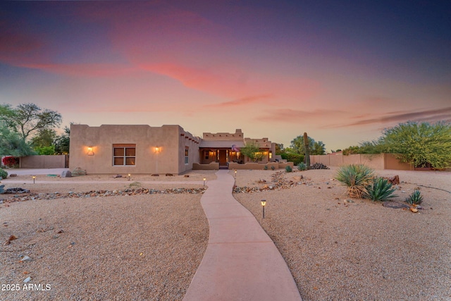 southwest-style home featuring a patio