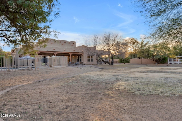 back of property featuring a patio area