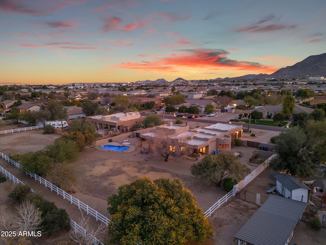 aerial view at dusk with a mountain view