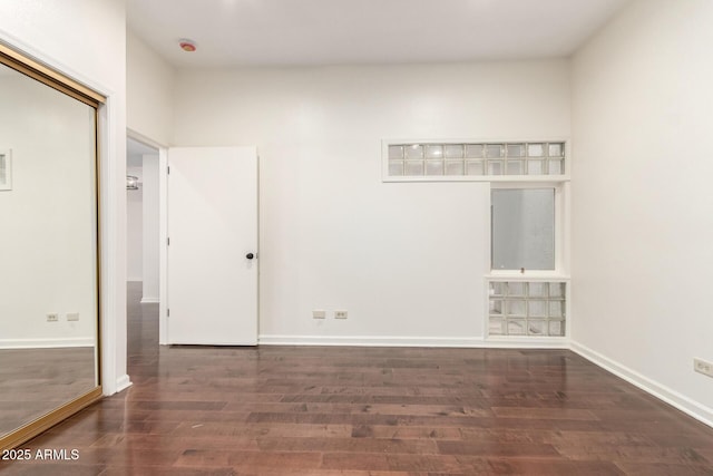 902 W Glendale Ave Unit 102, Phoenix, AZ 85021 - empty room with wood finished floors and baseboards
