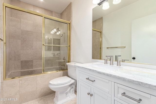 902 W Glendale Ave Unit 102, Phoenix, AZ 85021 - full bath with tile patterned flooring, toilet, tiled shower / bath, and vanity