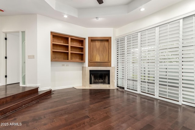 902 W Glendale Ave Unit 102, Phoenix, AZ 85021 - unfurnished living room with recessed lighting, wood finished floors, a fireplace, a ceiling fan, and baseboards