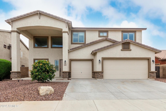 view of front of home with a garage