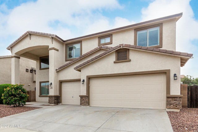 view of front of property with a garage