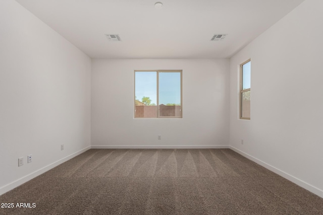 40563 W Michaels Dr, Maricopa, AZ 85138 - carpeted spare room featuring baseboards