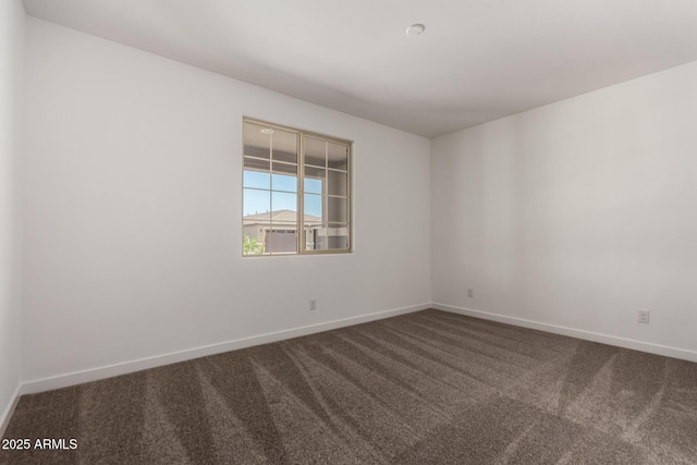 40563 W Michaels Dr, Maricopa, AZ 85138 - unfurnished room with carpet floors and baseboards