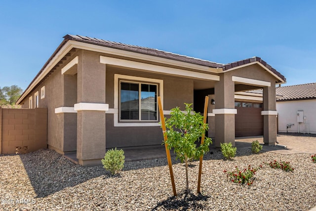 40563 W Michaels Dr, Maricopa, AZ 85138 - view of front facade with an attached garage and stucco siding