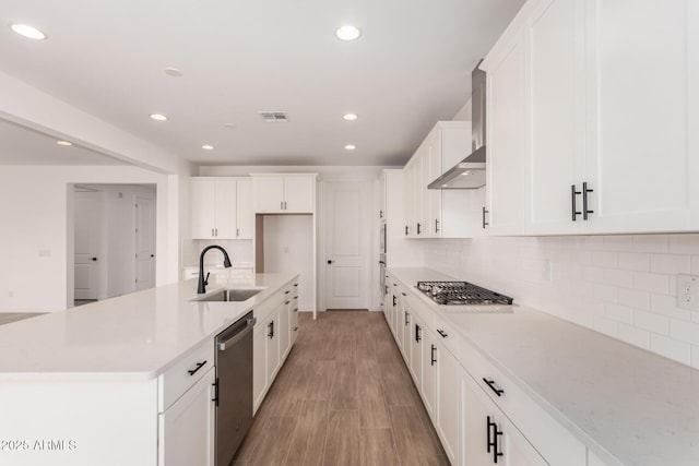 40563 W Michaels Dr, Maricopa, AZ 85138 - kitchen featuring a sink, stainless steel appliances, recessed lighting, backsplash, and white cabinetry