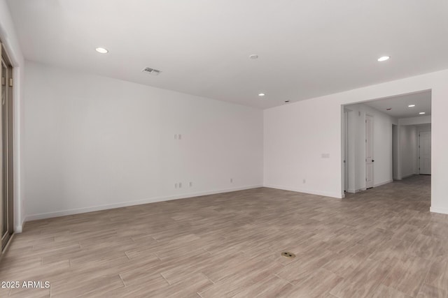 40563 W Michaels Dr, Maricopa, AZ 85138 - spare room featuring recessed lighting, light wood-type flooring, and baseboards