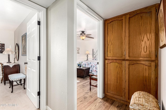 hallway featuring light wood-type flooring