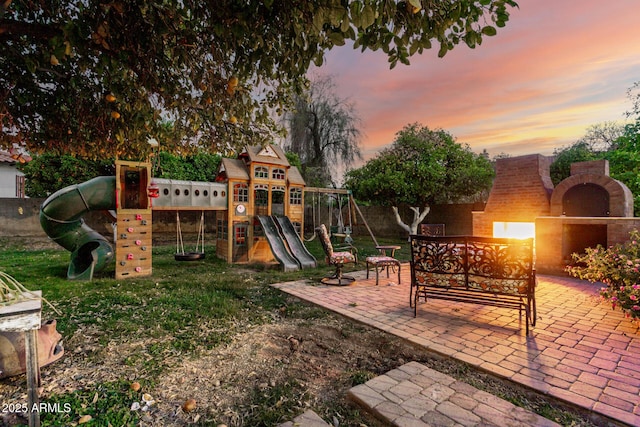 view of play area with a patio