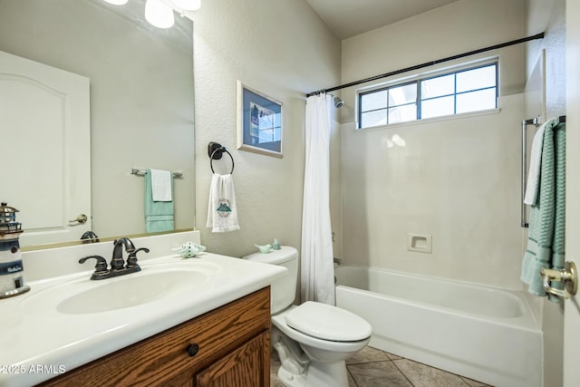 full bathroom featuring tile patterned flooring, vanity, shower / tub combo with curtain, and toilet