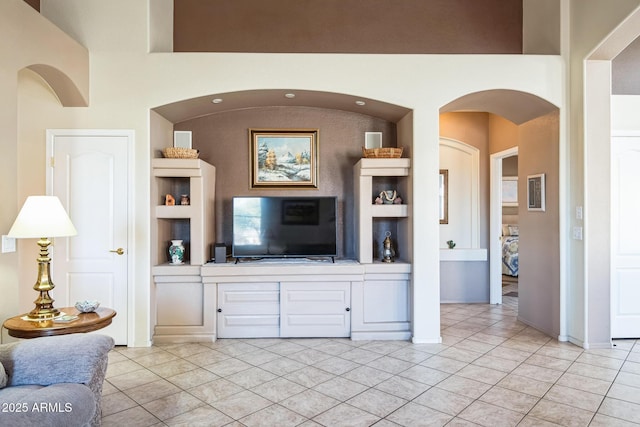 living room featuring light tile patterned flooring