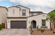 4855 E Shady Glen Ave, Scottsdale, AZ 85254 - view of front of home with an attached garage, driveway, and stucco siding