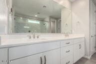 4855 E Shady Glen Ave, Scottsdale, AZ 85254 - bathroom featuring a shower stall and double vanity