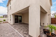 4855 E Shady Glen Ave, Scottsdale, AZ 85254 - back of property with stucco siding, fence, and a patio area
