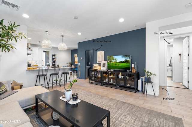 6338 W Raymond St, Phoenix, AZ 85043 - living area featuring recessed lighting and baseboards