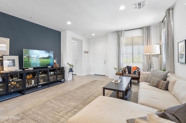6338 W Raymond St, Phoenix, AZ 85043 - living room featuring recessed lighting