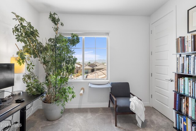 6338 W Raymond St, Phoenix, AZ 85043 - sitting room featuring carpet floors, a desk, and baseboards