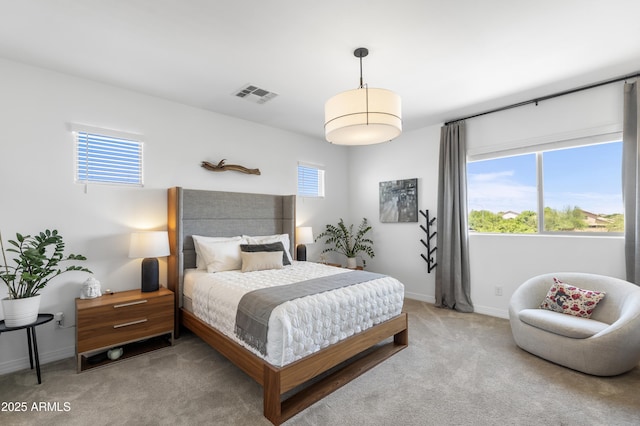6338 W Raymond St, Phoenix, AZ 85043 - carpeted bedroom with baseboards