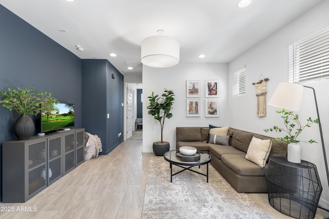 6338 W Raymond St, Phoenix, AZ 85043 - living room with recessed lighting and baseboards