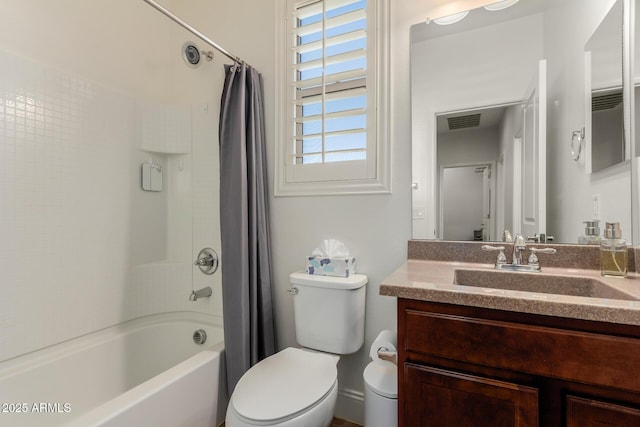 full bathroom featuring toilet, vanity, and shower / bath combination with curtain