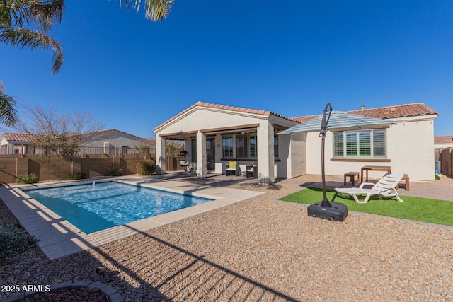 view of pool featuring a patio area