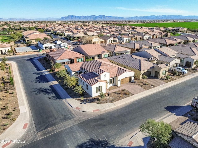 bird's eye view featuring a mountain view and a residential view