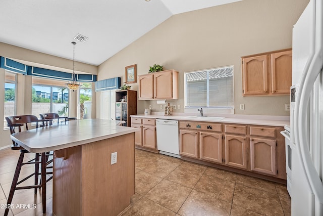 15194 W Vale Dr, Goodyear, AZ 85395 - kitchen with white appliances, light brown cabinets, a kitchen bar, light countertops, and high vaulted ceiling