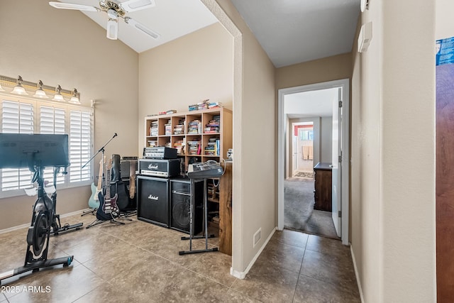 15194 W Vale Dr, Goodyear, AZ 85395 - tiled home office featuring a ceiling fan and a towering ceiling
