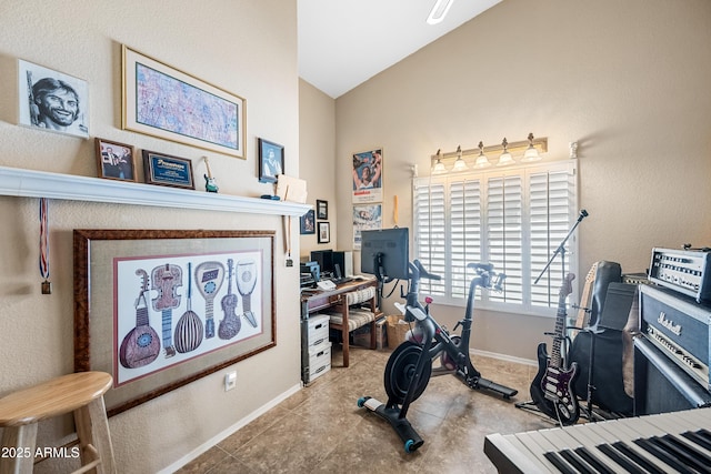 15194 W Vale Dr, Goodyear, AZ 85395 - workout room with lofted ceiling and baseboards