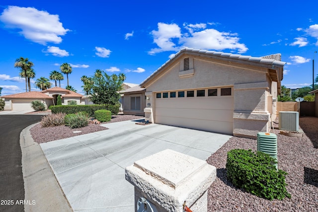15194 W Vale Dr, Goodyear, AZ 85395 - single story home featuring driveway, a garage, stucco siding, and a tiled roof