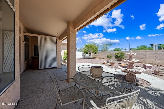 15194 W Vale Dr, Goodyear, AZ 85395 - fenced backyard with a patio area and outdoor dining space
