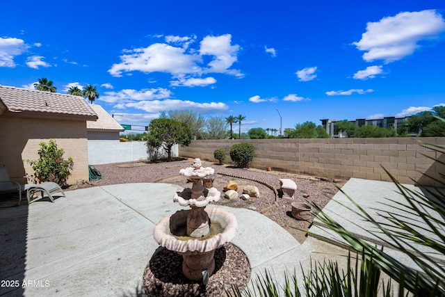 15194 W Vale Dr, Goodyear, AZ 85395 - fenced backyard featuring a patio