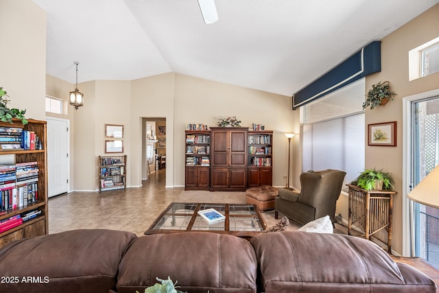15194 W Vale Dr, Goodyear, AZ 85395 - living room featuring vaulted ceiling and baseboards