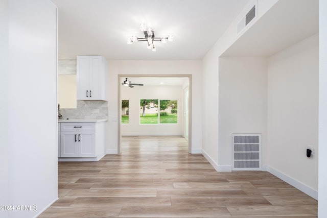 hall featuring light hardwood / wood-style flooring