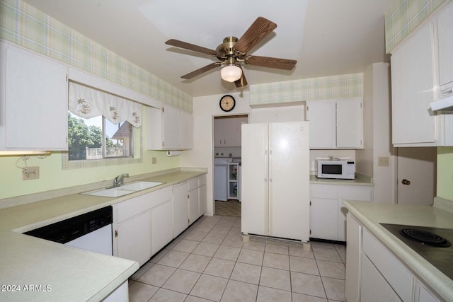 laundry room with cabinets and independent washer and dryer