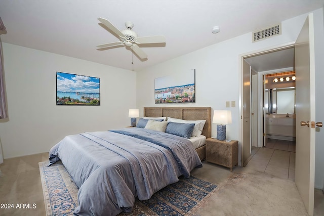 unfurnished bedroom with light carpet, a textured ceiling, a closet, and a ceiling fan