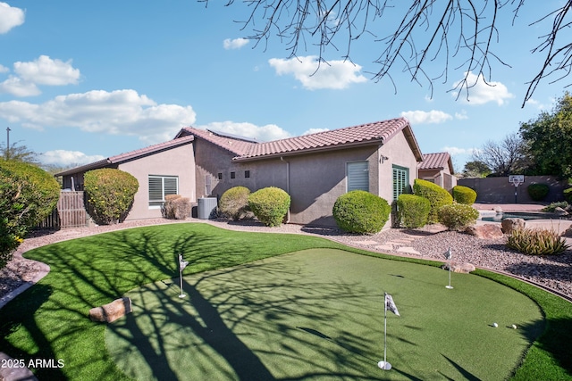 view of property exterior with central AC unit