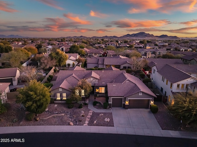 aerial view at dusk with a mountain view