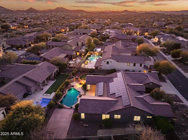 aerial view at dusk with a mountain view