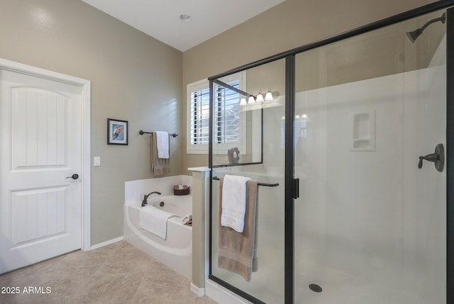 bathroom featuring tile patterned flooring and separate shower and tub