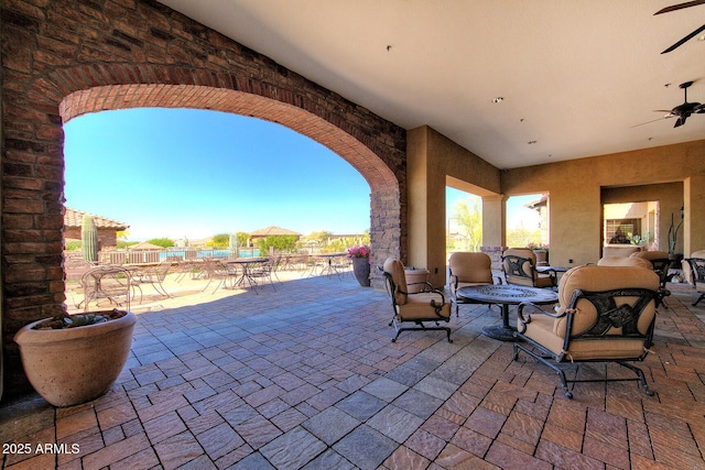 view of patio / terrace with ceiling fan