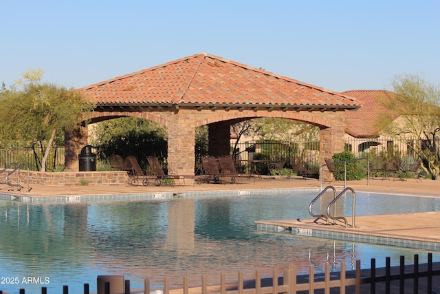 view of swimming pool featuring a patio