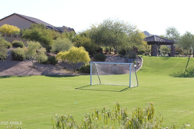 view of property's community with a gazebo