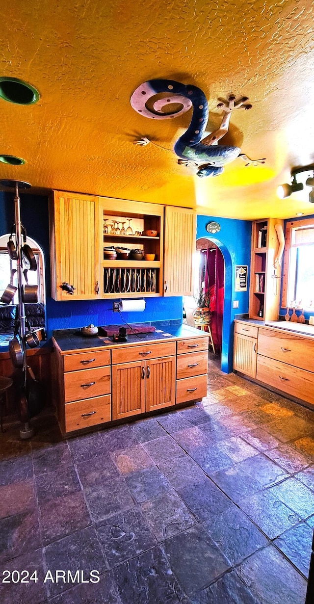 kitchen featuring a textured ceiling