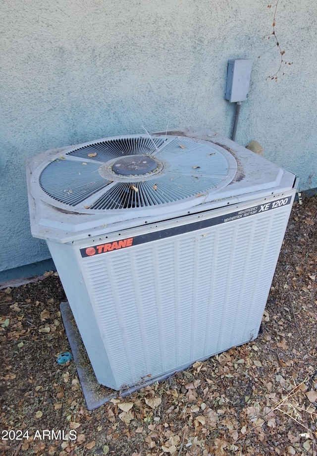 exterior details featuring cooling unit