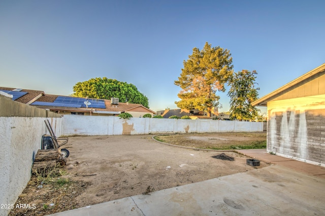 view of yard with a patio and a fenced backyard