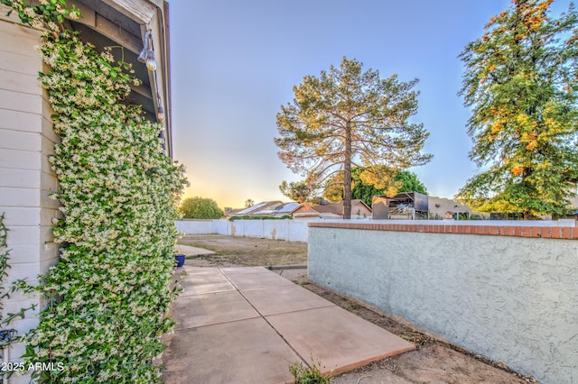 view of patio / terrace featuring fence